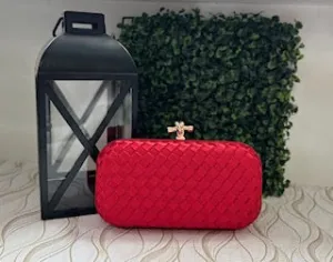 Plus red clutch bag